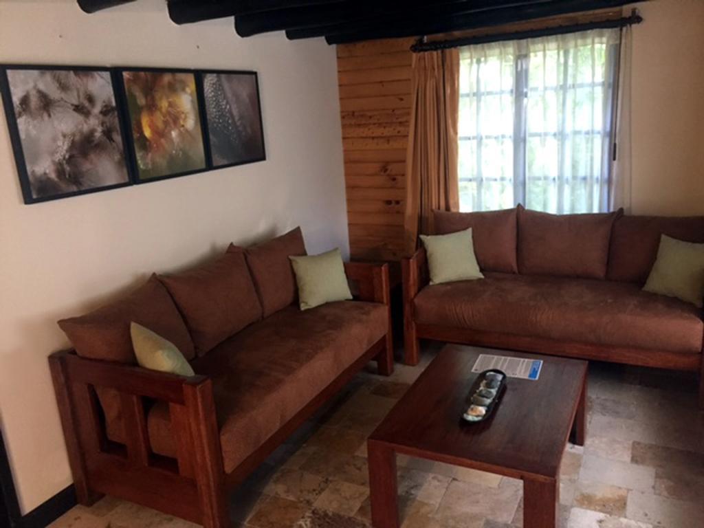 ホテル テルマス デ パパラクタ パパリャクタ エクステリア 写真 Living room at the lodge